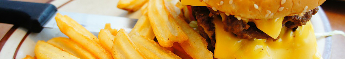 Eating Burger at Arnold's Old Fashioned Hamburgers restaurant in Tulsa, OK.